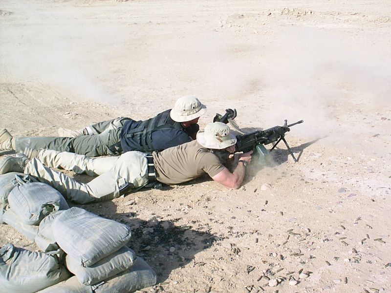 Two of the lads playing with a 5.56mm SAW (Squad Automatic Weapon)